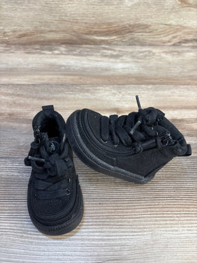 Top view of Billy Footwear adaptive high top sneakers size 5c in all black with side zipper closure and laces on wood plank background