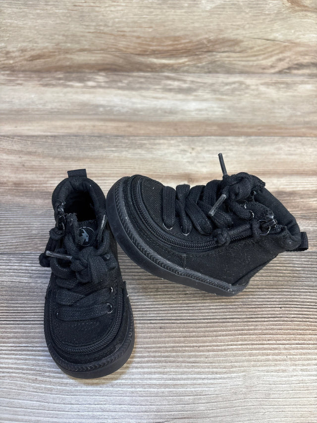 Top view of Billy Footwear adaptive high top sneakers size 5c in all black with side zipper closure and laces on wood plank background