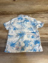 Kids short sleeve button-up shirt with blue tropical palm tree print on light fabric