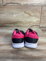 Back view of Champion Gusto toddler sneakers (size 3C) showing grey knit upper, pink heel trim, and white sole on wood background