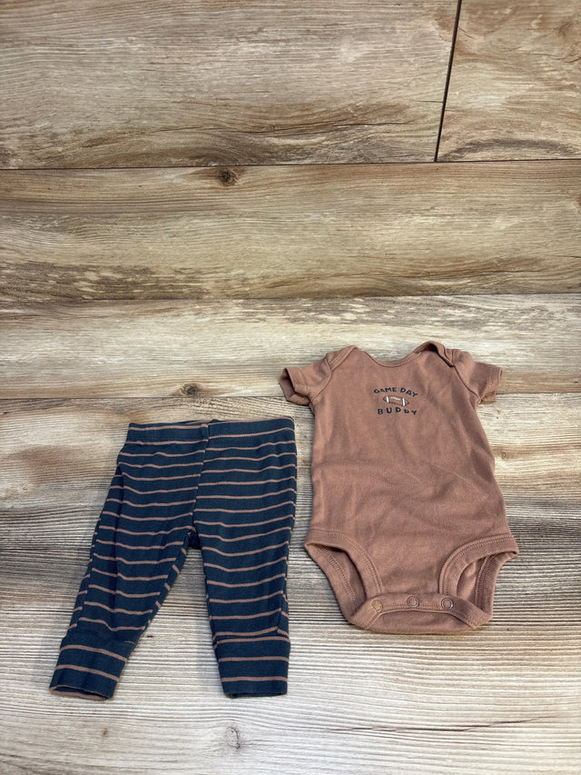 Top-down view of Carter's brown Game Day Buddy bodysuit with snap crotch and navy-striped leggings on wood floor