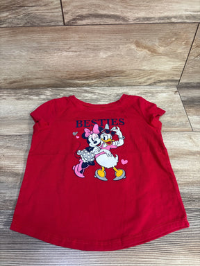 Front flat-lay of red Disney toddler tee 5T showing Minnie and Daisy hugging BESTIES graphic on wood floor