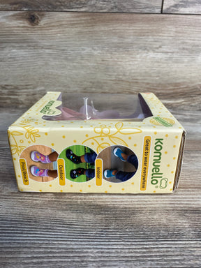 Komuello baby shoes in yellow box for pool, outdoor, and indoor use on wood background