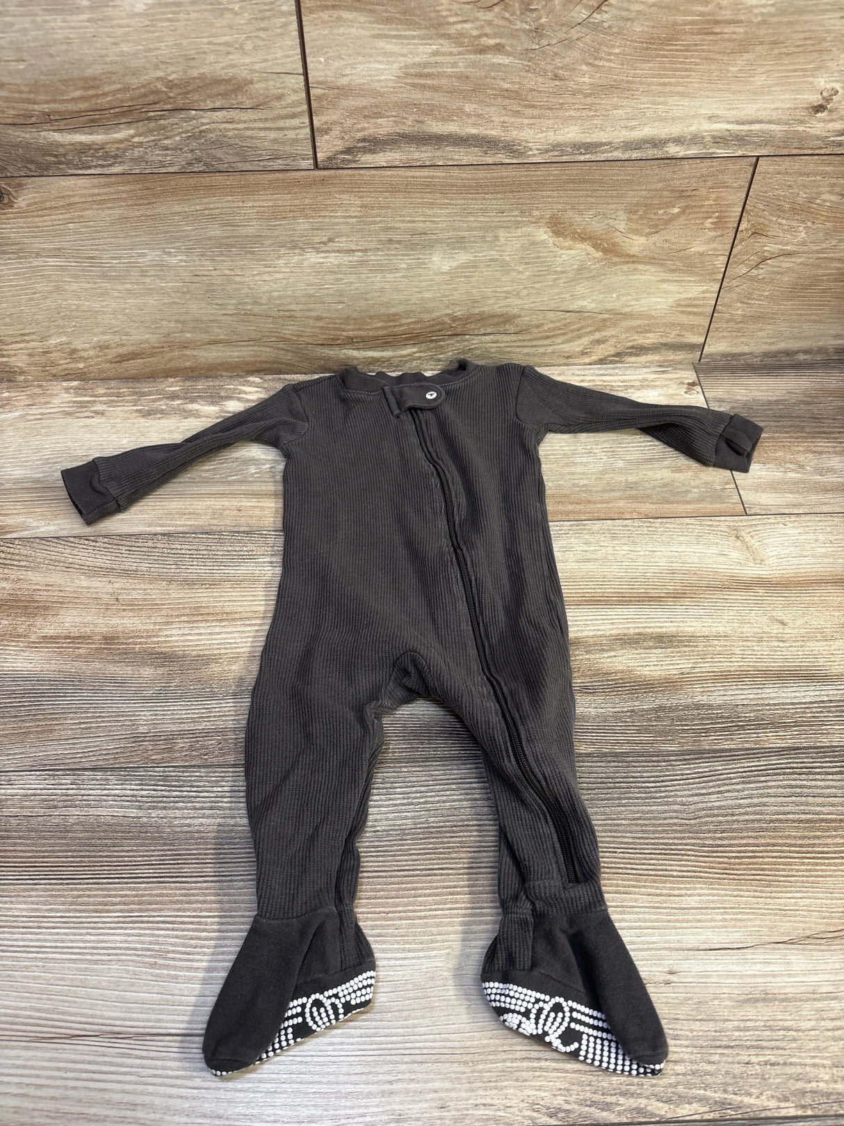 Front view of Burt’s Bees Baby grey waffle knit sleeper for ages 3 to 6 months with front zipper and grippy feet