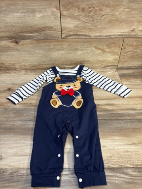 Baby boy outfit with navy overalls featuring teddy bear appliqué and striped long-sleeve shirt