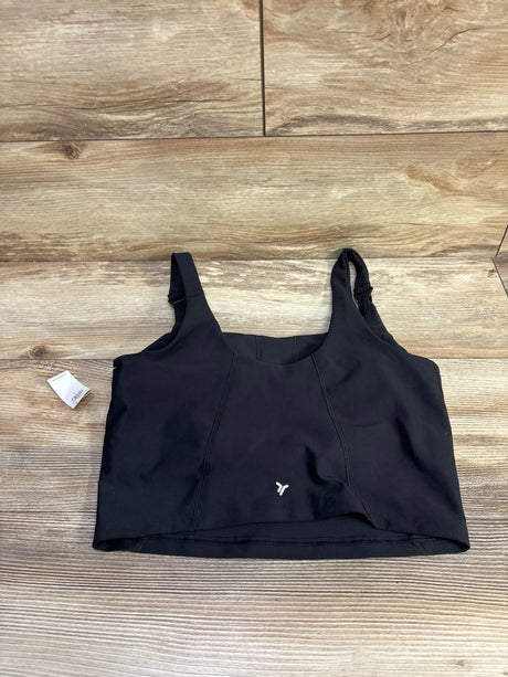 Front flat-lay of Old Navy nursing sports bra showing wide straps with nursing clip and longline band on wood background