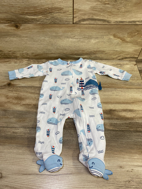 Front view of white Koala Baby sleeper, size 3 to 6 months, with whale and lighthouse print and footed design on wood flooring