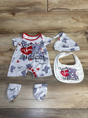 Baby romper outfit set with koala bear print, matching hat, mittens, and bib on wood floor