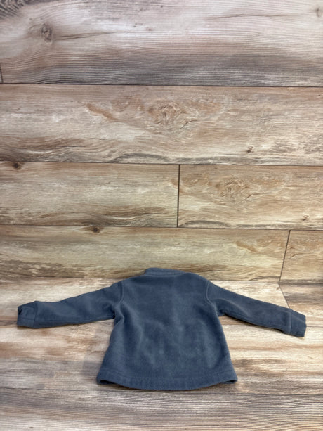 Back view of Columbia fleece full-zip toddler jacket showcasing soft grey fleece and long sleeves on wood background, size 2T