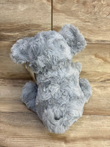 Rear view of Cloud Island grey elephant plush showing soft fuzzy fur and attached mini elephant on wood plank background