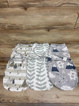 Overhead view of Yoofoss three-pack Grey swaddle wraps showcasing three patterned designs on a wood surface