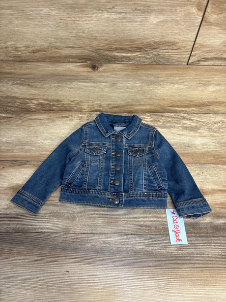 Cat & Jack toddler denim jacket with button front, laid flat on wood floor for kids clothing resale