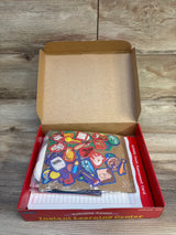 Children’s educational kit with colorful picture cards and learning materials in open box
