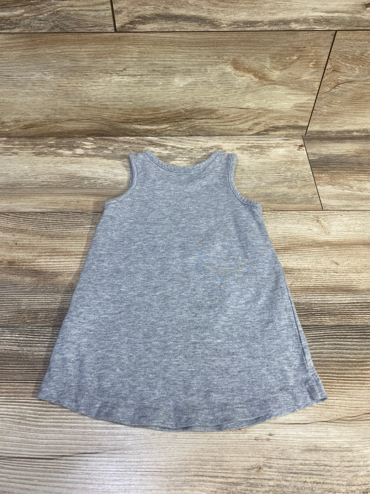 Back view of Nike toddler grey tank dress showcasing sleeveless A-line silhouette on wooden floor, size 2T