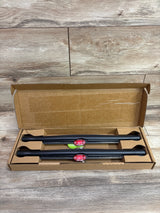 Top view of Munchkin Sun Safety Car Window Roller Shades 2pk showcasing two black shades in an open box