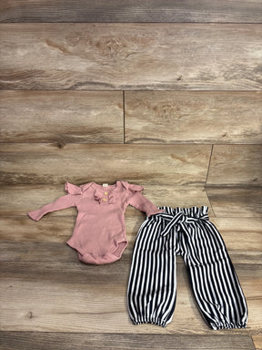 Pink ruffle long sleeve baby bodysuit with black and white striped toddler pants