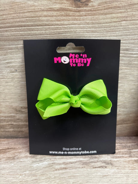 Solid lime green grosgrain hair bow on Me n Mommy To Be black packaging