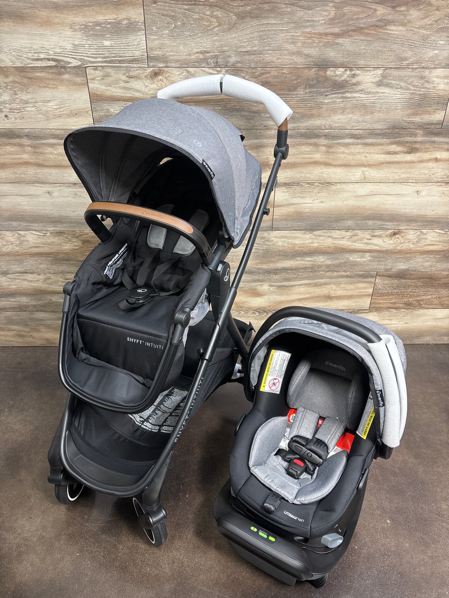 NEW Evenflo Shyft Intuiti Travel System with Revolve180 LiteMax NXT Car Seat, Fossil Gray