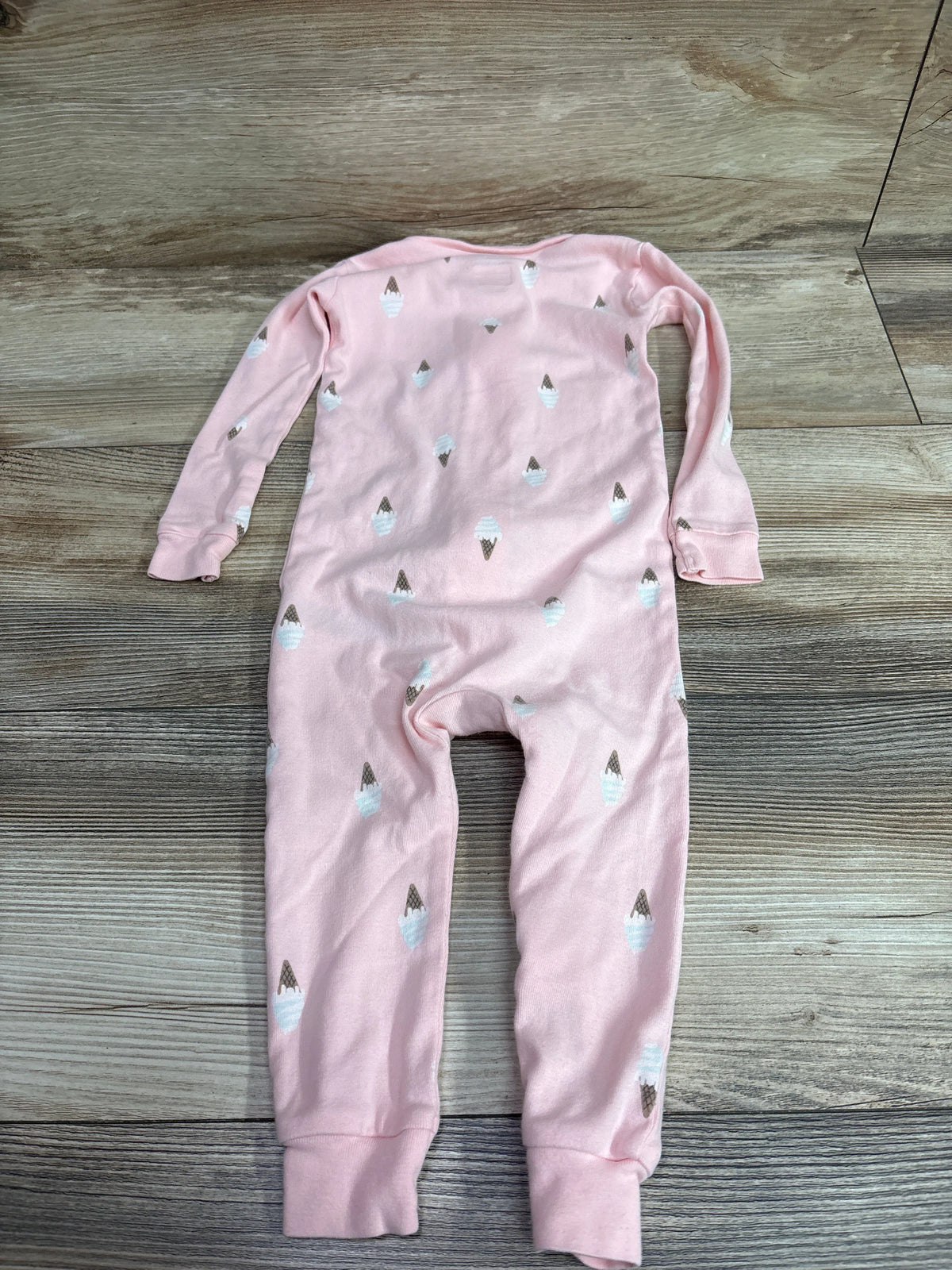Pink Pekkle baby sleeper with an ice cream cone print, size 18m