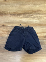 Flat lay Cat & Jack navy drawstring shorts with elastic waistband and front pockets, size 12 months