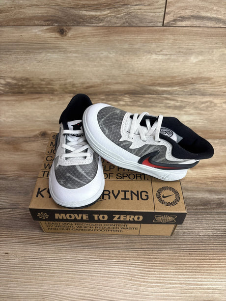 Top-front view of Nike Kyrie 8 TD toddler sneakers, white and university red, showing red Swoosh on a Move to Zero shoebox