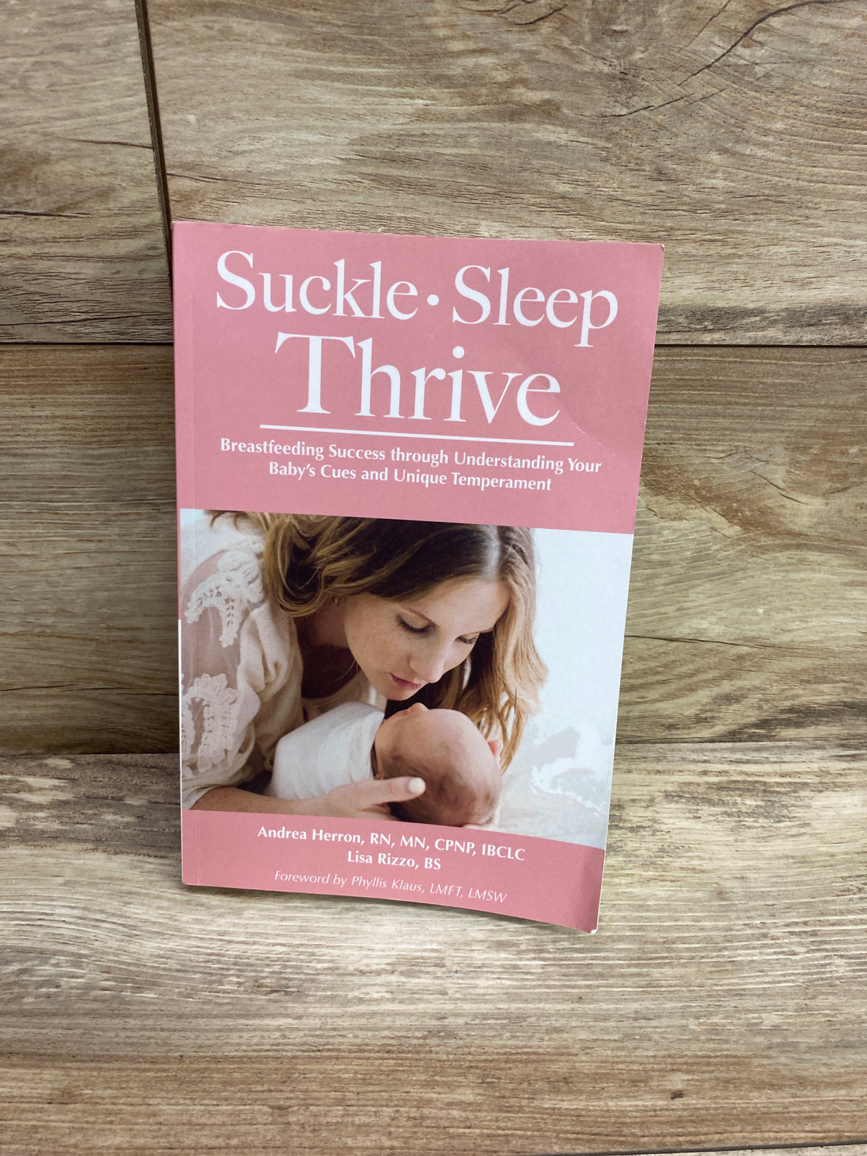 Suckle, Sleep, Thrive Paperback Book
