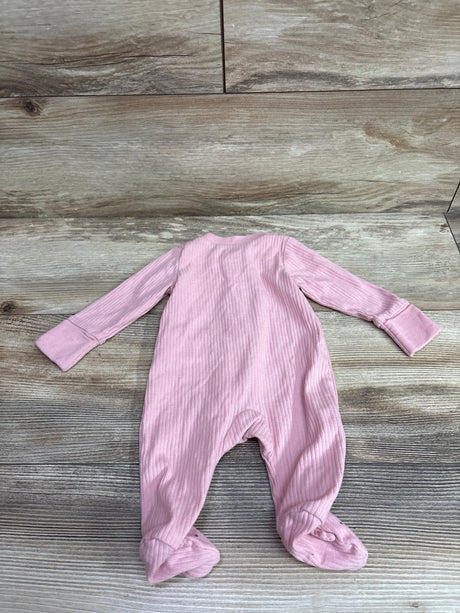 Pink ribbed newborn sleeper by Me n Mommy To Be laid flat on a wooden surface