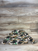 Flat lay of NEW Old Navy Camo Waffle Knit Shirt sz 5T showcasing green brown and cream camouflage print with long sleeves on wood plank background