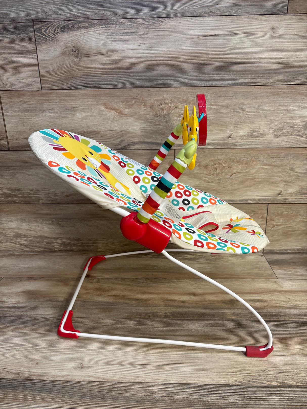Bright Starts Portable Baby Bouncer in Playful Pinwheels