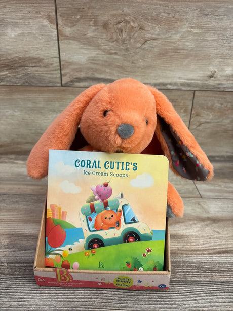 Front view of Happyhues Coral Cutie board book and plush bunny set with orange bunny and Ice Cream Scoops cover in display box