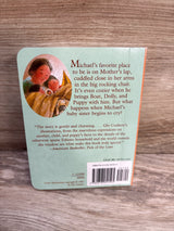 On Mother's Lap Board Book