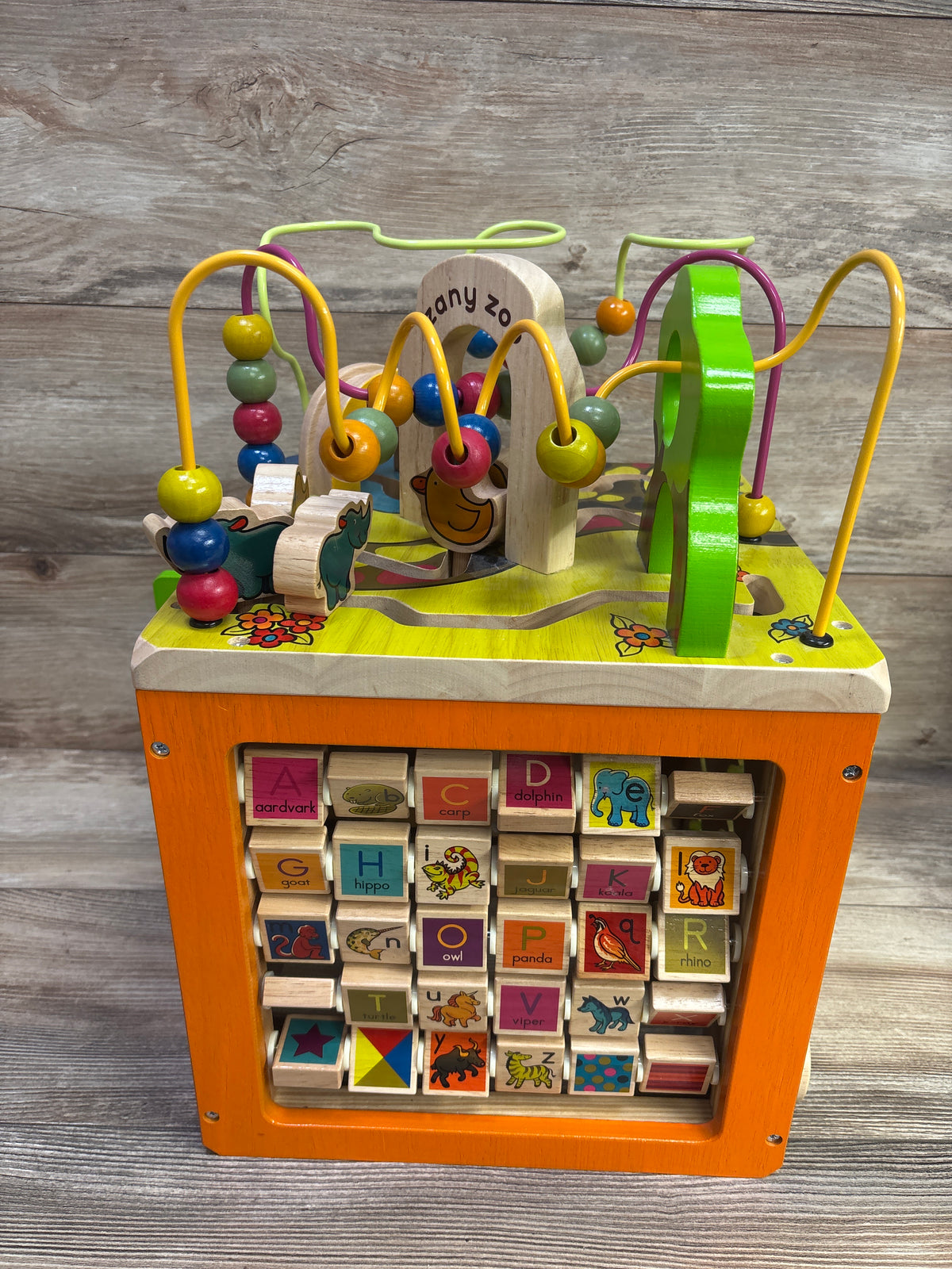 B. toys Zany Zoo Wooden Activity Cube