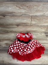 Red toddler dress with white polka dots, puff sleeves, black waist bow, and Minnie Mouse detail on chest