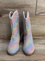Pair of children's glittery multicolor checkered boots with side zippers on wooden floor
