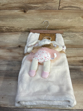 Front view of new DreamGro doll and baby blanket white bunny set showcasing plush bunny doll in floral skirt with hangtag on wood plank floor