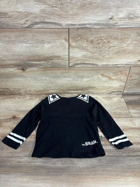 Black long sleeve toddler shirt with star shoulder accents and white stripes on sleeves
