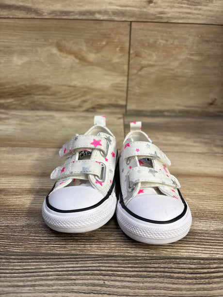 Front view of Converse Chuck Taylor All Star 2V Low Top Sneakers with two straps and pink and gray stars on a wood floor