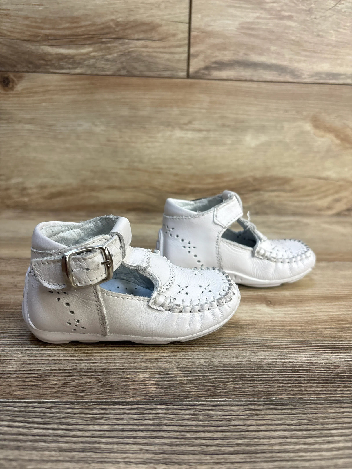 White baby Mary Jane shoes with buckle, soft sole, perfect for infants and toddlers