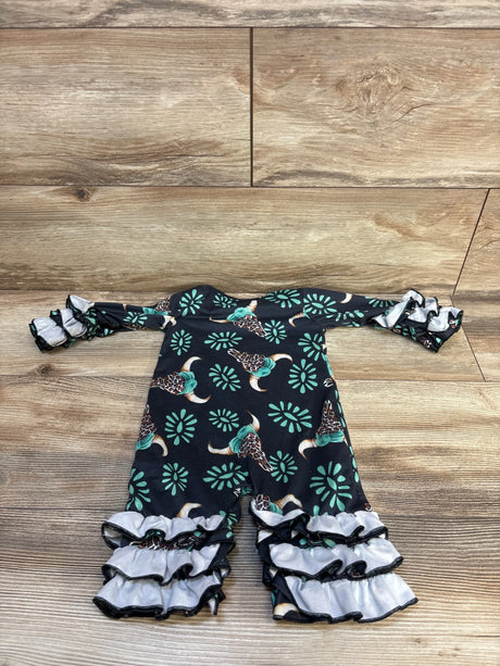 Flat lay of black longhorn ruffle coverall for 3-6 month baby, front view showing teal longhorn pattern and layered ruffle cuffs on wooden floor