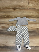 Gray and white checkered baby outfit set with hat, long sleeve top, and footed pants on wood floor