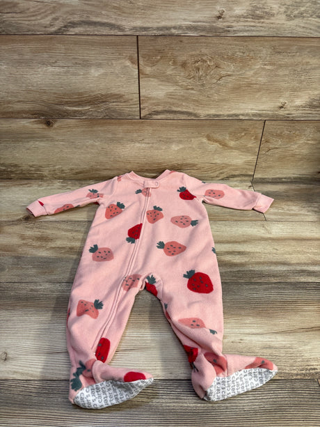 Flat lay view of Carter’s strawberry sleeper showing full length zipper, footed legs, strawberry print on wood floor