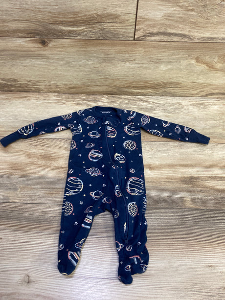 Front view of Member’s Mark organic sleeper with navy space print, long sleeves, footed legs, and front zipper on wood floor