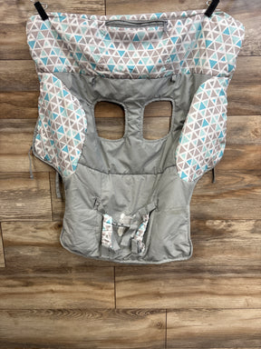 Front of Carter's 2-in-1 cart/high-chair cover with leg openings, harness, and teal triangle sides on wood floor