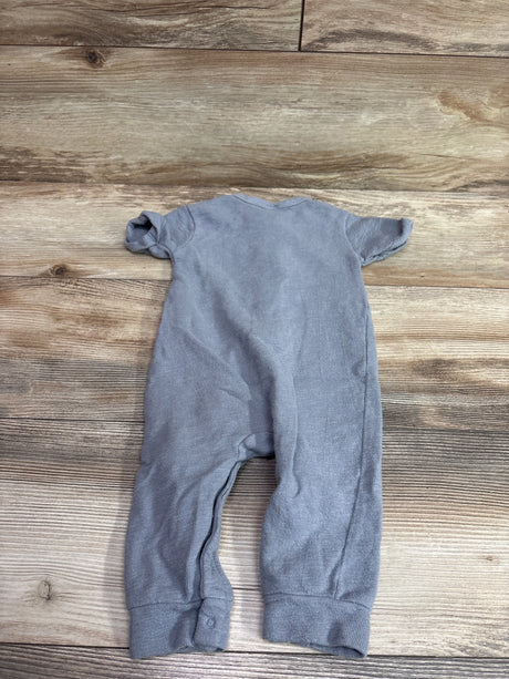 Back view of a grey Modern Moments Henley jumpsuit for infants size 6-9 months on a wooden background