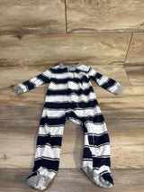 Flat lay of Burt's Bees Baby sleeper 6-9 months, navy and white stripes, front zipper, gray grippy feet on wood