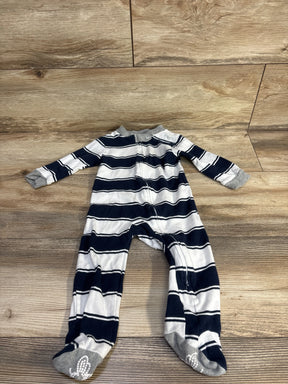 Flat lay of Burt's Bees Baby sleeper 6-9 months, navy and white stripes, front zipper, gray grippy feet on wood