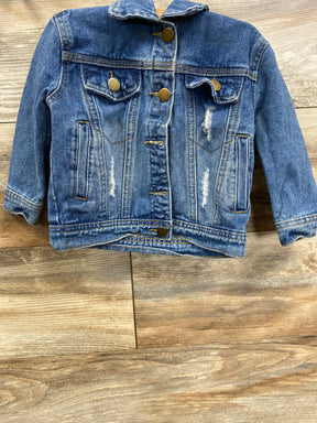 Kids distressed blue denim jacket with brass buttons on wooden background