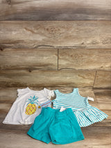 Toddler girl outfit set with pineapple graphic tee, turquoise shorts, and striped dress.