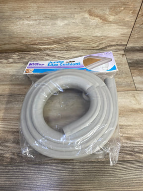 Top-down view of KidKusion jumbo edge cushion in taupe with thick foam padding coiled in plastic packaging on wood floor