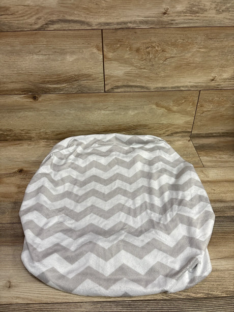 Summer Infant chevron soft changing pad cover in white and grey on a wooden surface